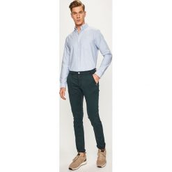 Jack & Jones - Koszula. Niebieskie koszule męskie Jack & Jones, s, bez wzorów, z bawełny, casualowe, button down, z długim rękawem. W wyprzedaży za 99,90 zł.