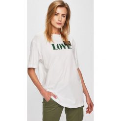 Calvin Klein - Top. Białe bluzki damskie Calvin Klein, s, z nadrukiem, z bawełny, z okrągłym kołnierzem, z krótkim rękawem. W wyprzedaży za 199,90 zł.