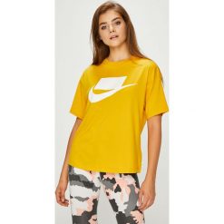 Nike Sportswear - Top. Szare topy damskie Nike Sportswear, m, z nadrukiem, z bawełny, z okrągłym kołnierzem. W wyprzedaży za 119,90 zł.
