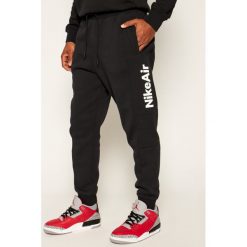 Spodnie dresowe NIKE Air Fleece CJ4830. Czarne jeansy męskie Nike, xxl, bez wzorów. Za 269,00 zł.