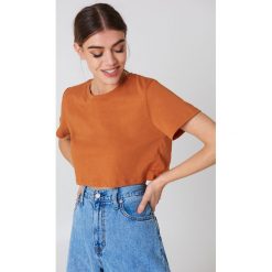 NA-KD Basic Krótki T-shirt oversize - Orange,Copper. Pomarańczowe t-shirty damskie marki NA-KD Basic, bez wzorów, klasyczne, bez kołnierzyka. W wyprzedaży za 20,47 zł.