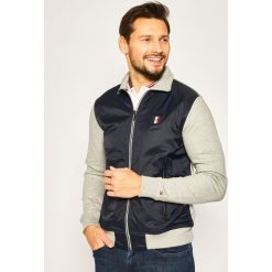 Bluza TOMMY HILFIGER Mixed Media Zip Throuch MW0MW13054. Niebieskie bluzy męskie TOMMY HILFIGER, xl, bez wzorów, z bawełny, bez kołnierzyka, bez rękawów, bez kaptura. W wyprzedaży za 539,00 zł.
