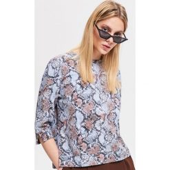 Bluza z motywem zwierzęcym - Wielobarwn. Szare bluzy damskie Reserved, s, bez wzorów, bez rękawów, bez kaptura. Za 79,99 zł.