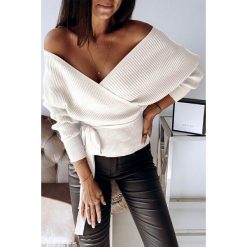 Sweter damski PERISTA. Bluzki damskie Sweter damski PERISTA, uniwersalny, bez wzorów, eleganckie, bez kołnierzyka, bez rękawów. W wyprzedaży za 59,00 zł.