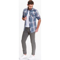Spodnie męskie slim ze strukturalnej elastycznej tkaniny. Pomarańczowe spodnie męskie Top Secret, na co dzień, na lato, m, bez wzorów, z tkaniny, eleganckie. W wyprzedaży za 59,99 zł.