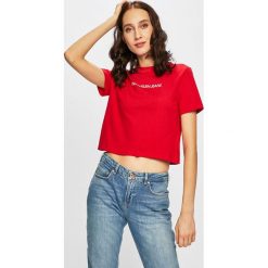 Calvin Klein Jeans - Top. Czarne bluzki damskie marki Calvin Klein Jeans, s, z nadrukiem, z bawełny, z okrągłym kołnierzem. Za 139,90 zł.