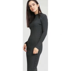 Ciemnoszara Sukienka Powder Grey. Szare sukienki dzianinowe marki other, na jesień, l, mini. Za 89,99 zł.