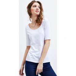 Bluzka basic. Bluzki damskie Moodo, xs, bez wzorów, bez kołnierzyka, bez rękawów. Za 9,99 zł.