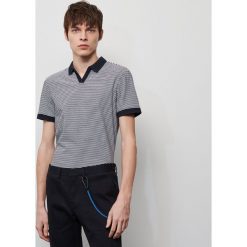 Koszulka polo regular fit - Biały. Białe koszulki polo męskie Reserved, s, bez wzorów, bez rękawów. Za 79,99 zł.