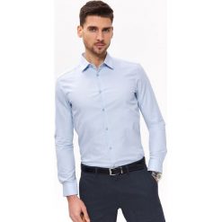 Koszula typu oxford regularna. Niebieskie koszule męskie Top Secret, m, bez wzorów, klasyczne, z klasycznym kołnierzykiem, bez rękawów. Za 64,99 zł.