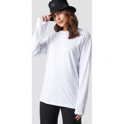 NA-KD Basic Unisex Long Sleeve Top - White. Białe topy damskie marki NA-KD Basic, bez wzorów, z okrągłym kołnierzem. Za 92,95 zł.