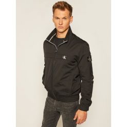 Kurtka przejściowa Calvin Klein Jeans Harrington J30J315672. Niebieskie kurtki męskie Calvin Klein Jeans, m, bez wzorów, z jeansu, bez kaptura. Za 649,00 zł.