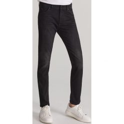Jeansy slim z efektem sprania - Czarny. Czarne jeansy męskie Reserved, m, bez wzorów. Za 169,99 zł.