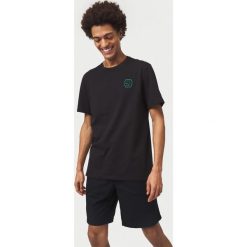 O'Neill Team Hybrid Koszulka Czarny. Czarne podkoszulki męskie O'Neill, m, z nadrukiem, z elastanu, bez kołnierzyka, krótkie. Za 180,95 zł.