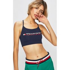 Tommy Sport - Biustonosz sportowy. Niebieskie biustonosze sportowe damskie Tommy Sport, s, z nadrukiem, z elastanu. W wyprzedaży za 99,90 zł.
