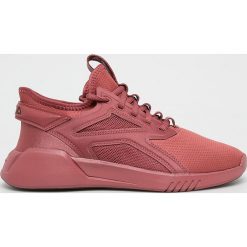Reebok - Buty Freestyle Motion Lo. Różowe buty sportowe damskie Reebok, bez wzorów, z materiału, sportowe. Za 299,90 zł.
