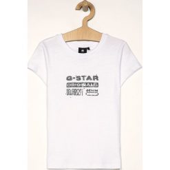 G-Star Raw - T-shirt dziecięcy 128-164 cm. Białe bluzki dziewczęce G-Star RAW, z nadrukiem, z bawełny, z okrągłym kołnierzem, z krótkim rękawem, krótkie, bez kaptura. W wyprzedaży za 99,90 zł.