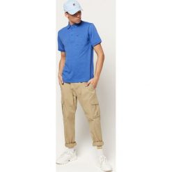 O'Neill Jack's Base Polo Koszulka Niebieski. Niebieskie podkoszulki męskie O'Neill, s, bez wzorów, z bawełny, polo, bez rękawów. Za 137,95 zł.