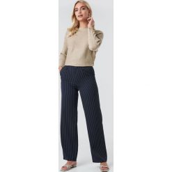 NA-KD Classic Rozszerzane spodnie w prążki - Blue. Niebieskie spodnie damskie NA-KD Classic. Za 202,95 zł.