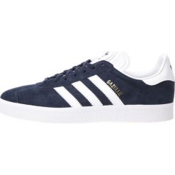 Adidas Originals Gazelle Tenisówki Niebieski. Niebieskie trampki męskie adidas Originals, bez wzorów, ze skóry, bez zapięcia. Za 464,95 zł.