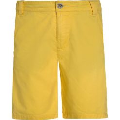 Timberland Szorty mimosa. Żółte spodenki chłopięce marki Timberland, z bawełny. W wyprzedaży za 125,40 zł.
