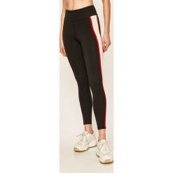 New Balance - Legginsy. Czarne spodnie damskie New Balance, s, z aplikacjami, z elastanu. W wyprzedaży za 129,90 zł.
