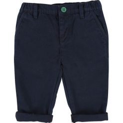 Spodnie w kolorze granatowym. Niebieskie spodnie niemowlęce Billieblush & Billybandit, w paski, z bawełny. W wyprzedaży za 65,95 zł.