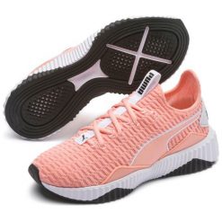 Puma Tenisówki Damskie Defy Wn S Peach Bud 37. Pomarańczowe buty sportowe damskie Puma, bez wzorów, bez zapięcia. W wyprzedaży za 302,00 zł.