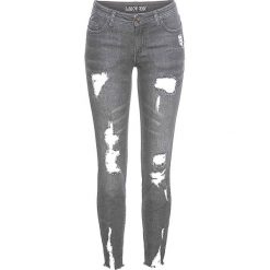 Dżinsy Super Skinny "destroyed" bonprix jasnoszary denim. Szare jeansy damskie bonprix. Za 109,99 zł.