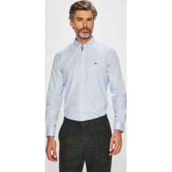 Lacoste - Koszula. Niebieskie koszule męskie marki Lacoste, s, z bawełny, casualowe, button down, z długim rękawem. W wyprzedaży za 359,90 zł.