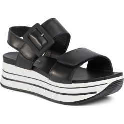 Sandały IGI&CO - 5175500 Nero. Czarne klapki damskie IGI&CO, bez wzorów, ze skóry, bez obcasa, na koturnie. W wyprzedaży za 279,00 zł.