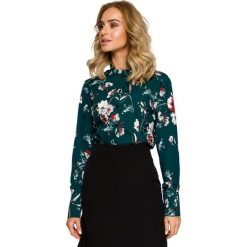 Bluzka koszulowa w kwiaty - zielona. Zielone bluzki damskie Moe, s, z nadrukiem, z elastanu, eleganckie, z falbankami, bez rękawów. Za 149,00 zł.