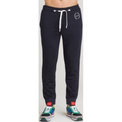 SPODNIE DRESOWE Armani Exchange. Szare spodnie męskie m, z dresówki. Za 449,00 zł.
