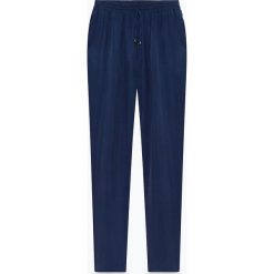 Spodnie "Meadow" w kolorze granatowym. Niebieskie spodnie damskie American Vintage, s, z materiału. W wyprzedaży za 214,95 zł.