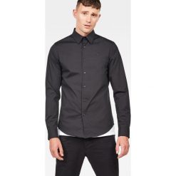 G-Star Raw - Koszula. Czarne koszule męskie G-Star RAW, xl, bez wzorów, z bawełny, klasyczne, z klasycznym kołnierzykiem, z długim rękawem. W wyprzedaży za 259,90 zł.