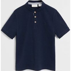 Mango Kids - Polo dziecięce Hanoi 110-164 cm. Białe t-shirty chłopięce Mango Kids, bez wzorów, z bawełny, z krótkim rękawem. Za 59,90 zł.