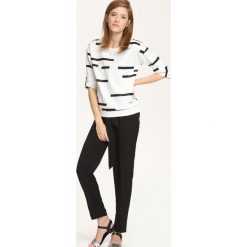 Bluza nierozpinana damska. Białe bluzy damskie TROLL, s, z nadrukiem, bez rękawów, bez kaptura. W wyprzedaży za 44,99 zł.