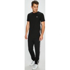 Fila - Spodnie. Czarne spodnie męskie Fila, na co dzień, xl, bez wzorów, z bawełny, casualowe. W wyprzedaży za 279,90 zł.