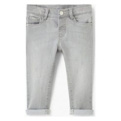Mango Kids - Jeansy dziecięce Elena 80-98 cm. Szare jeansy dziewczęce marki Mango Kids, z bawełny. W wyprzedaży za 49,90 zł.