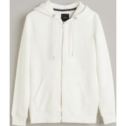 Rozpinana bluza z bawełny organicznej - Biały. Białe bluzy męskie Reserved, s, bez wzorów, z bawełny, bez kołnierzyka, bez rękawów, bez kaptura. Za 89,99 zł.