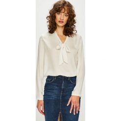 Only - Bluzka. Białe bluzki damskie ONLY, s, bez wzorów, z poliesteru, bez kołnierzyka, bez rękawów. W wyprzedaży za 79,90 zł.