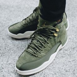 Buty Air Jordan 12 Retro "Olive Canvas" (130690-301). Brązowe buty sportowe męskie marki Jordan, ze skóry. Za 729,99 zł.