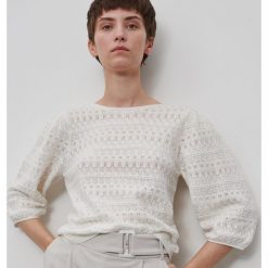 Sweter z ażurowym wzorem - Kremowy. Białe swetry damskie Reserved, s, bez wzorów, bez rękawów, bez kaptura. Za 69,99 zł.