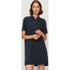Tommy Jeans - Sukienka. Niebieskie sukienki damskie Tommy Jeans, na co dzień, s, bez wzorów, z bawełny, casualowe, bez kołnierzyka, z krótkim rękawem, krótkie, mini, proste. Za 399,90 zł.