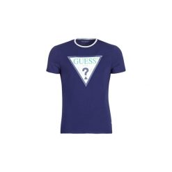 T-shirty z krótkim rękawem Guess GUESS CLUB. Niebieskie t-shirty męskie marki Guess, s, z aplikacjami, bez kołnierzyka, krótkie. Za 159,00 zł.
