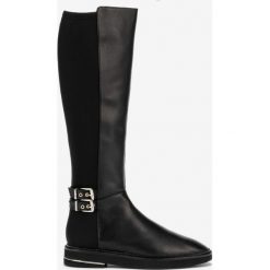 DKNY Lena Kozaki Czarny. Czarne kozaki damskie DKNY, ze lnu, bez obcasa, bez zapięcia. Za 922,95 zł.