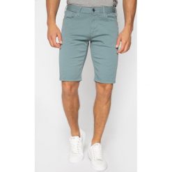 Szorty materiałowe Emporio Armani 3H1PA6 1N4ZZ 0751. Zielone spodenki i szorty męskie Emporio Armani, m, bez wzorów, z elastanu. W wyprzedaży za 439,00 zł.