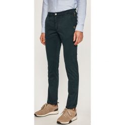 Camel Active - Spodnie. Zielone spodnie męskie Camel Active, bez wzorów, z elastanu. W wyprzedaży za 299,90 zł.