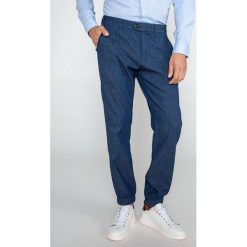 Scotch & Soda Spodnie Niebieski. Niebieskie spodnie męskie Scotch & Soda, bez wzorów, z elastanu. Za 585,95 zł.