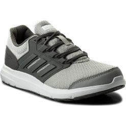 Buty adidas - Galaxy 4 W CP8834 Gretwo/Grefou/Msilve. Szare buty do biegania damskie Adidas, z materiału. W wyprzedaży za 179,00 zł.